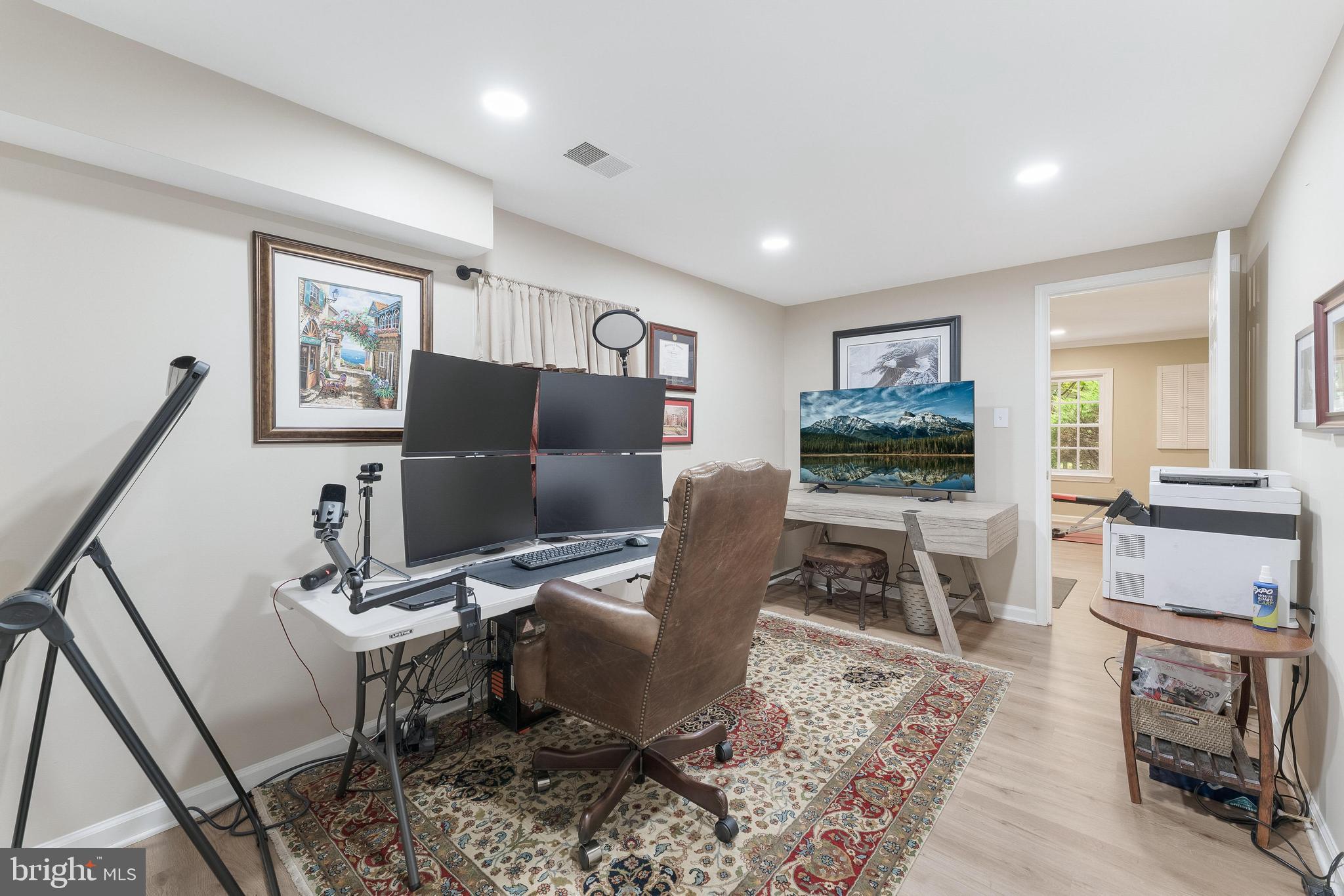 1248 Lamplighter Way Reston, VA 20194 - Photo 44 of 64 a workspace with furniture and a flat screen tv