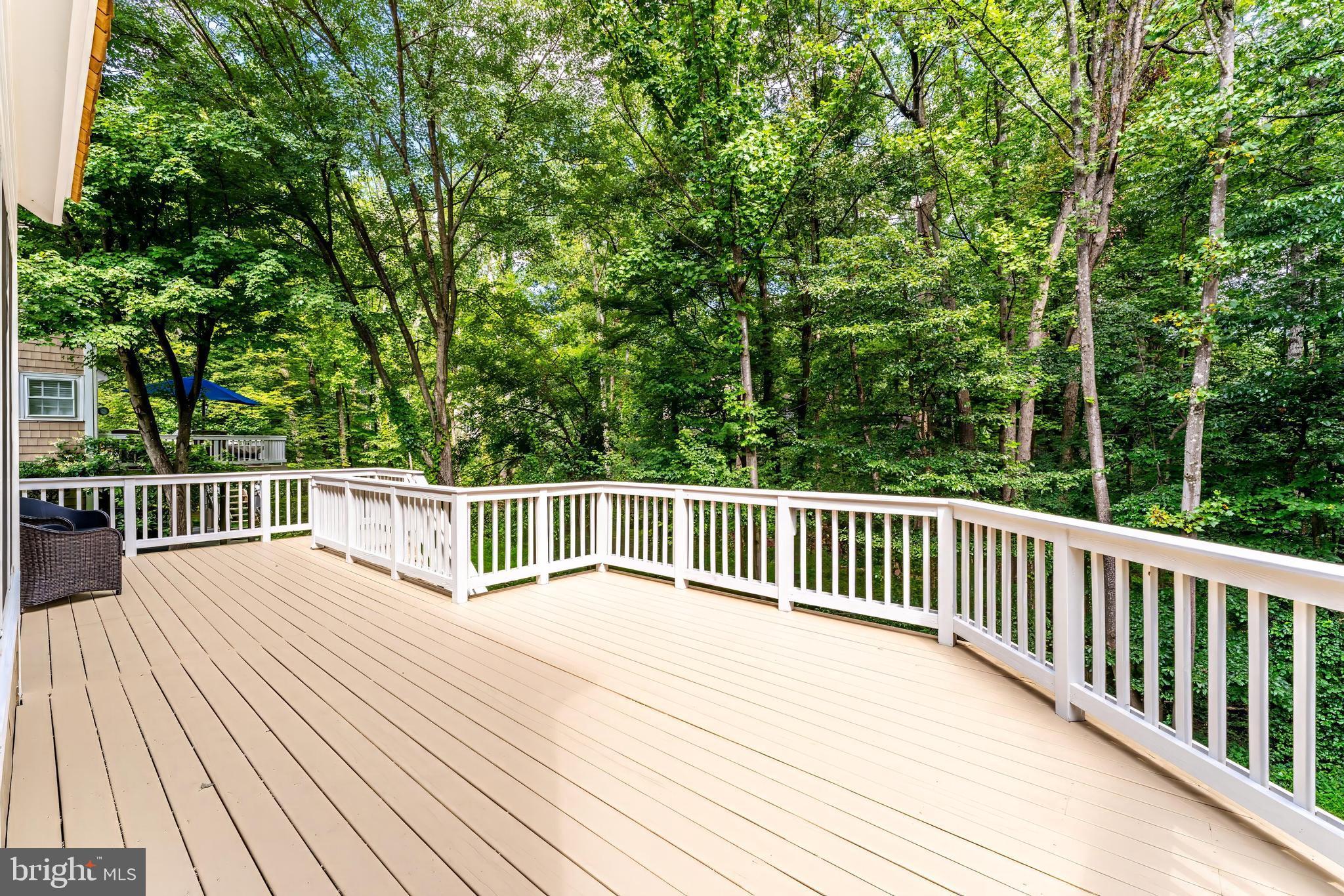 1248 Lamplighter Way Reston, VA 20194 - Photo 50 of 64 a view of balcony with deck and wooden floor