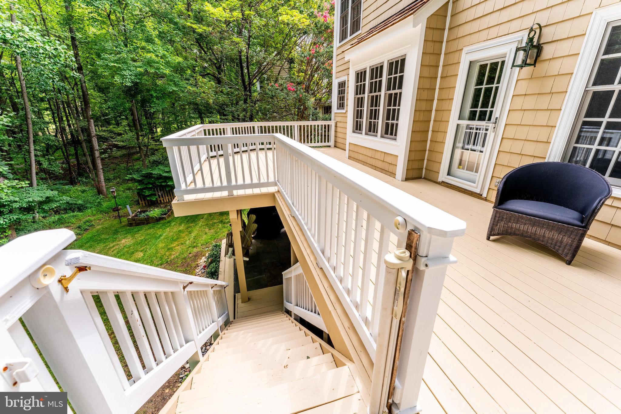 1248 Lamplighter Way Reston, VA 20194 - Photo 52 of 64 a view of balcony with wooden floor and outdoor seating