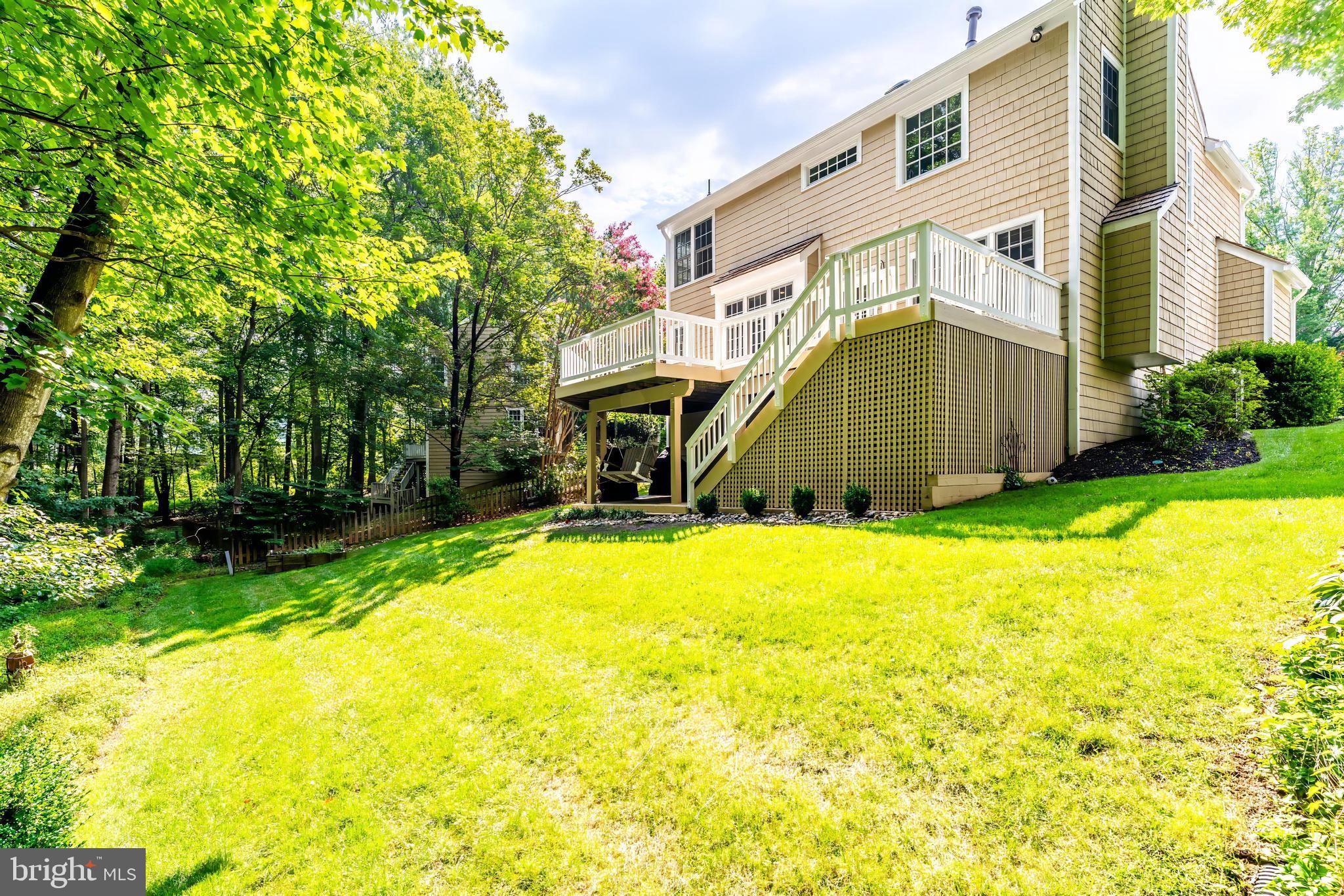 1248 Lamplighter Way Reston, VA 20194 - Photo 55 of 64 a view of a house with a backyard
