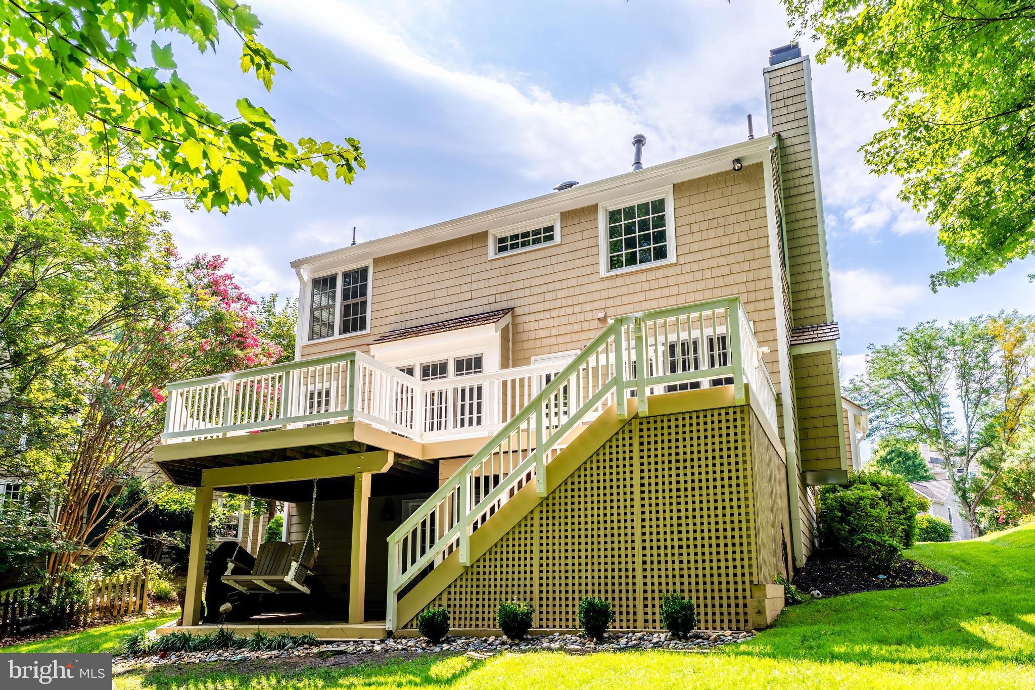 1248 Lamplighter Way Reston, VA 20194 - Photo 56 of 64 a view of a house with a yard and potted plants