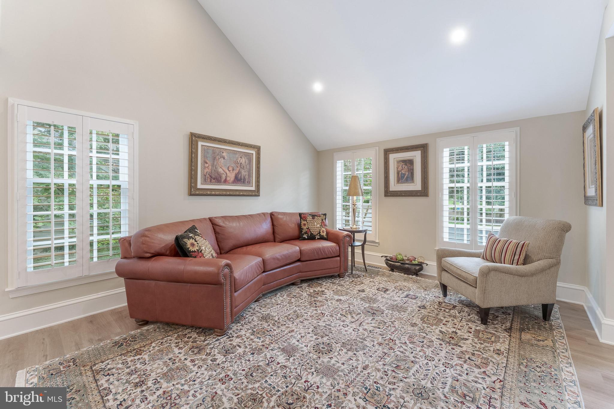 1248 Lamplighter Way Reston, VA 20194 - Photo 7 of 64 a living room with furniture and windows