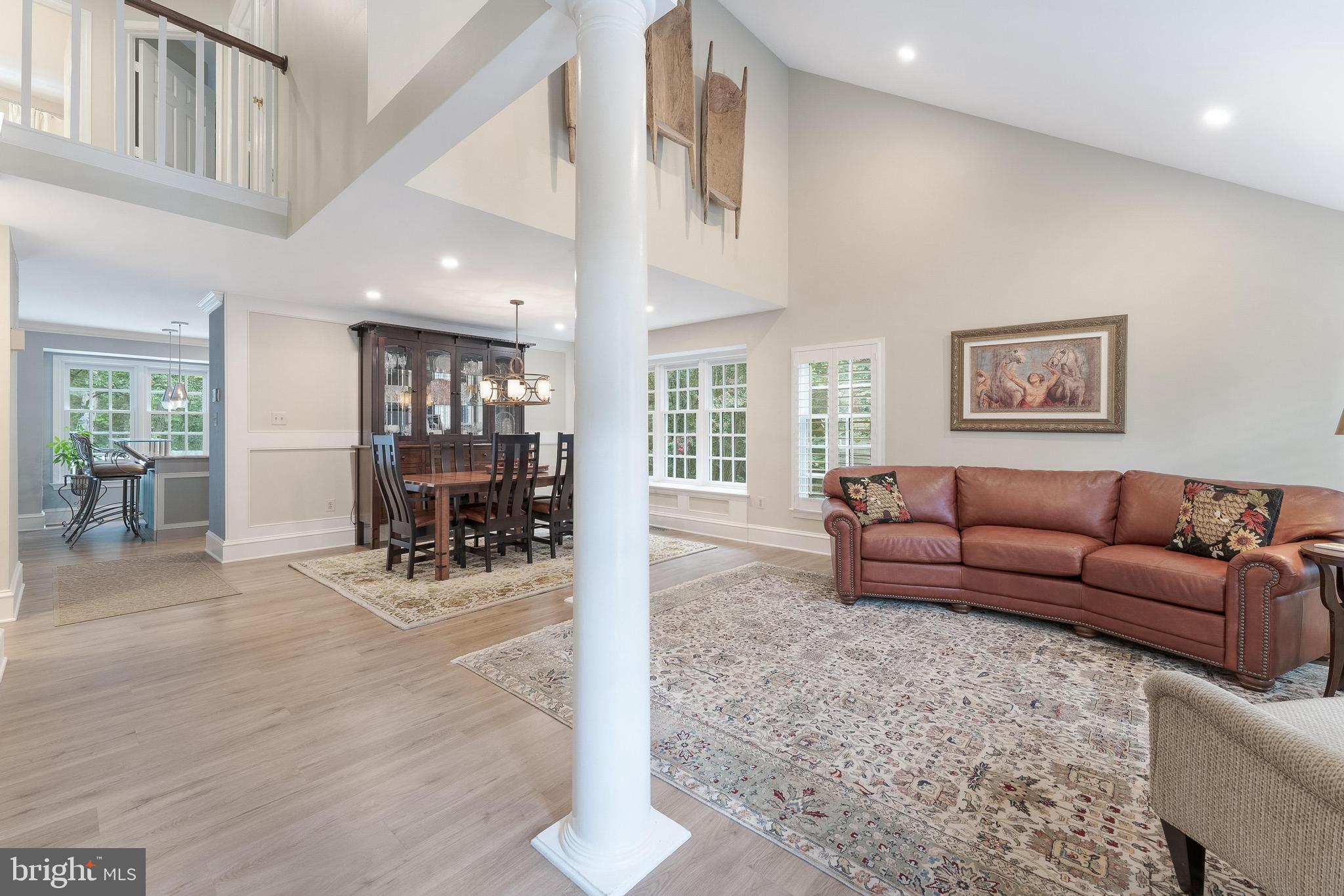 1248 Lamplighter Way Reston, VA 20194 - Photo 8 of 64 a living room with furniture and wooden floor