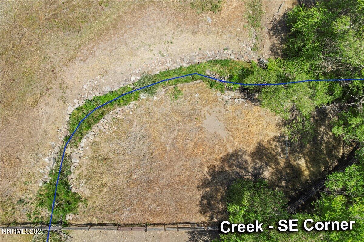 2800 Holcomb Ranch Lane Reno, NV 89511 - Photo 13 of 21 a view of a dry yard with wooden fence