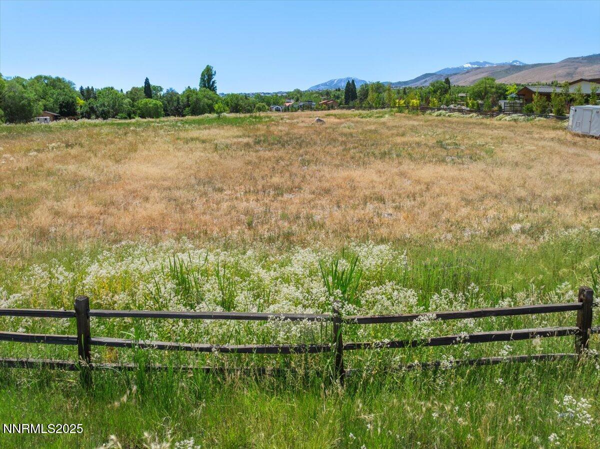 2800 Holcomb Ranch Lane Reno, NV 89511 - Photo 16 of 21 a view of lake with green space