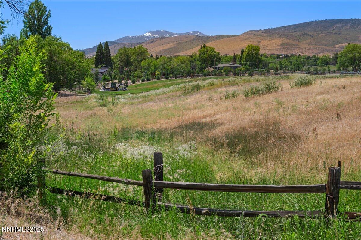 2800 Holcomb Ranch Lane Reno, NV 89511 - Photo 18 of 21 a view of a lake with a mountain in the background