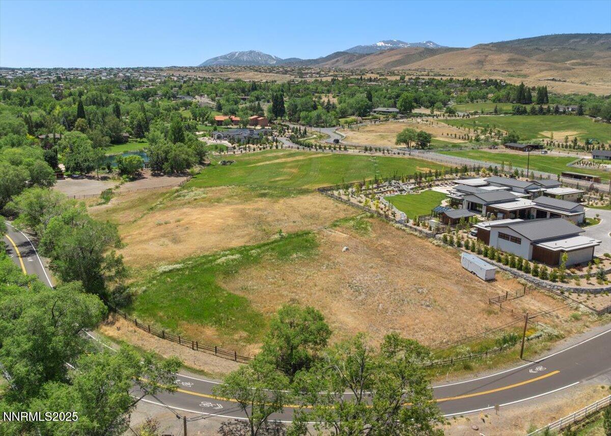 2800 Holcomb Ranch Lane Reno, NV 89511 - Photo 5 of 21 a view of a lake with a mountain