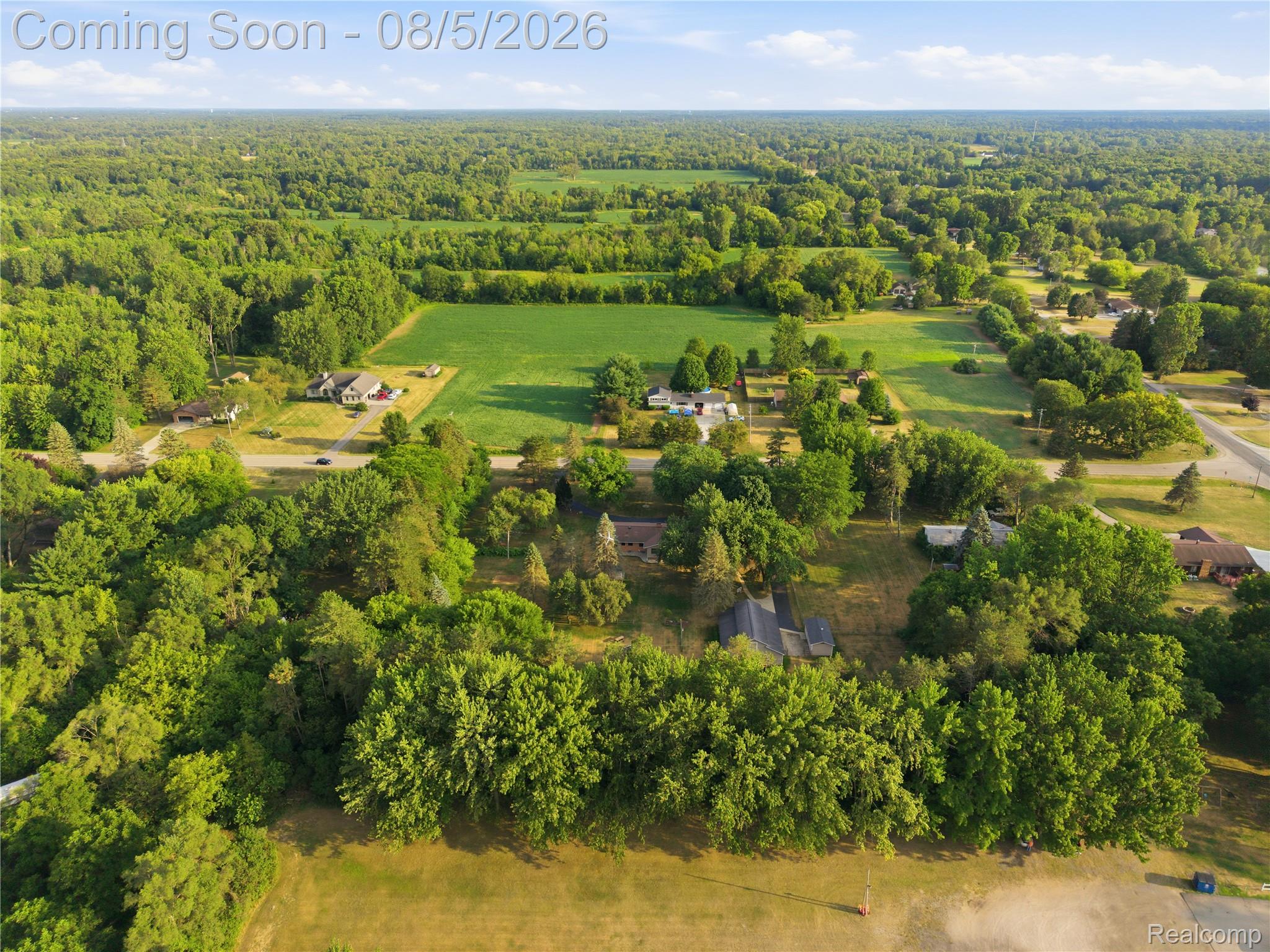 6478 West Stanley Road Mount Morris, MI 48458 - Photo 75 of 80 Expansive aerial perspective showcasing a verdant landscape with mature trees and open fields