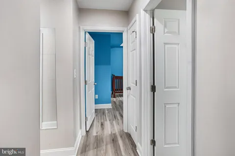 a view of a bathroom from a hallway