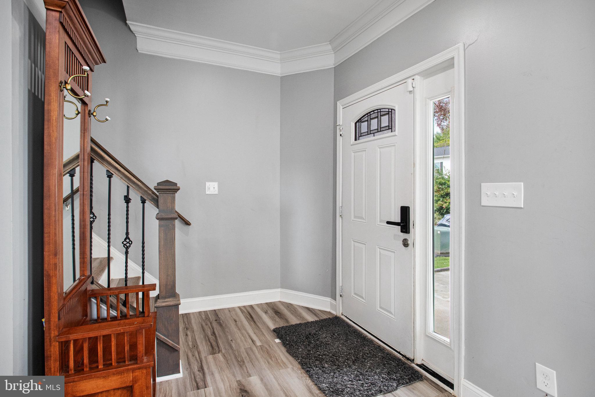 2452 24th Street Fredericksburg, VA 22408 - Photo 4 of 30 a view of an entryway with wooden floor