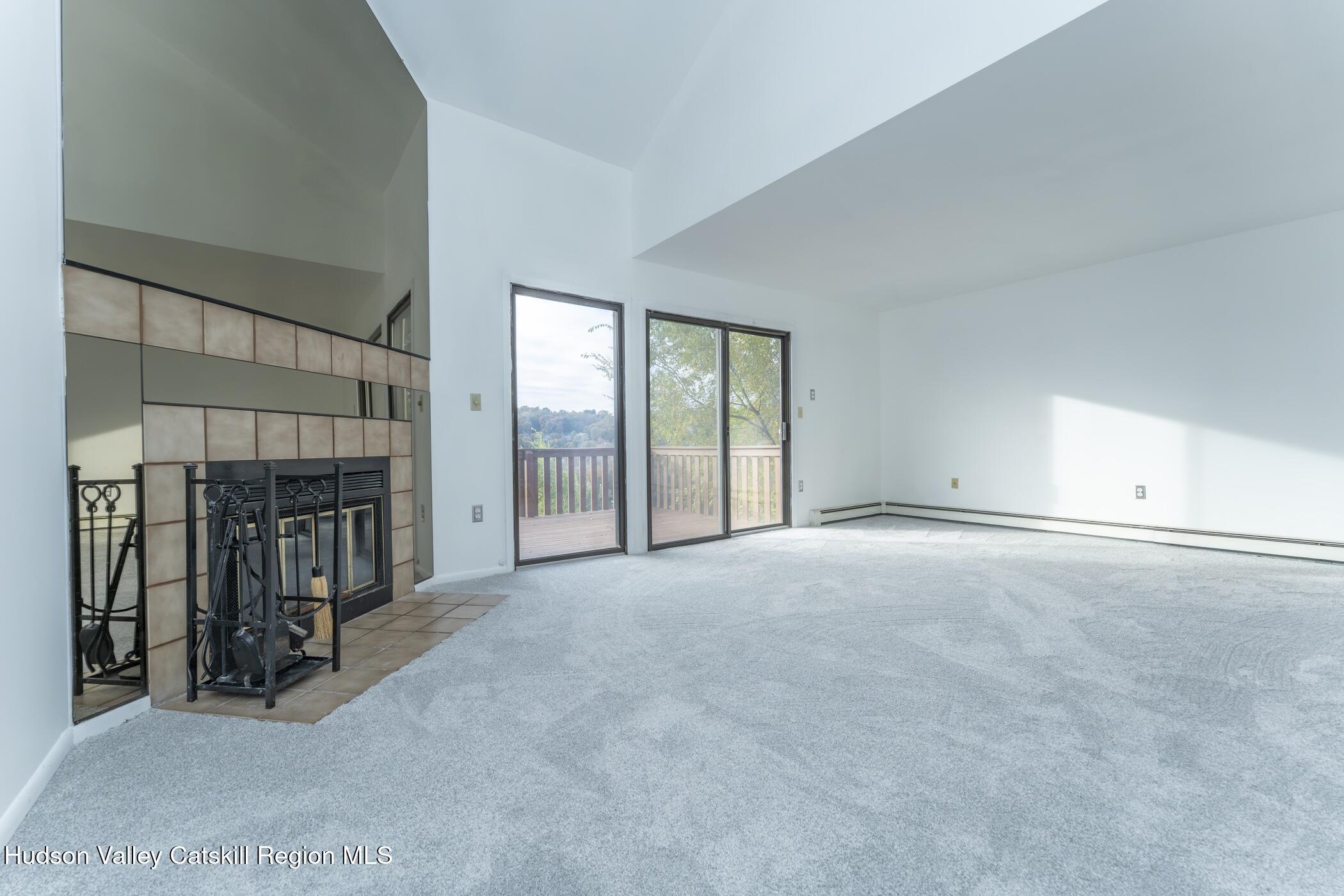 34 Rondout Harbor Port Ewen, NY 12466 - Photo 18 of 42 an empty room with fireplace