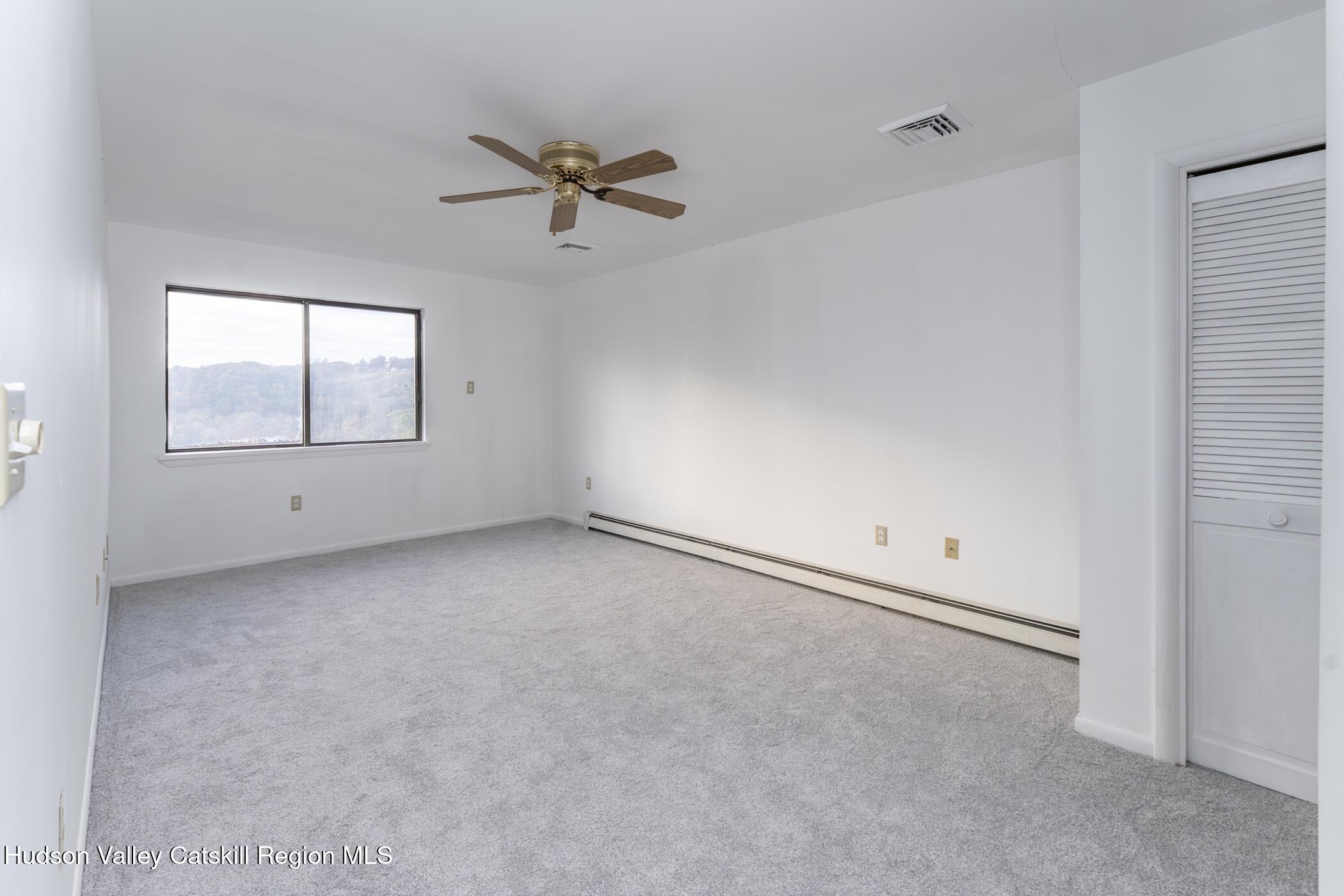 34 Rondout Harbor Port Ewen, NY 12466 - Photo 34 of 42 a view of an empty room with a window