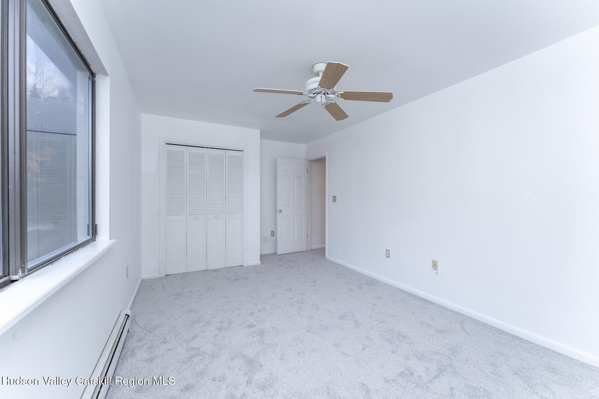 34 Rondout Harbor Port Ewen, NY 12466 - Photo 36 of 42 a view of room with a ceiling fan