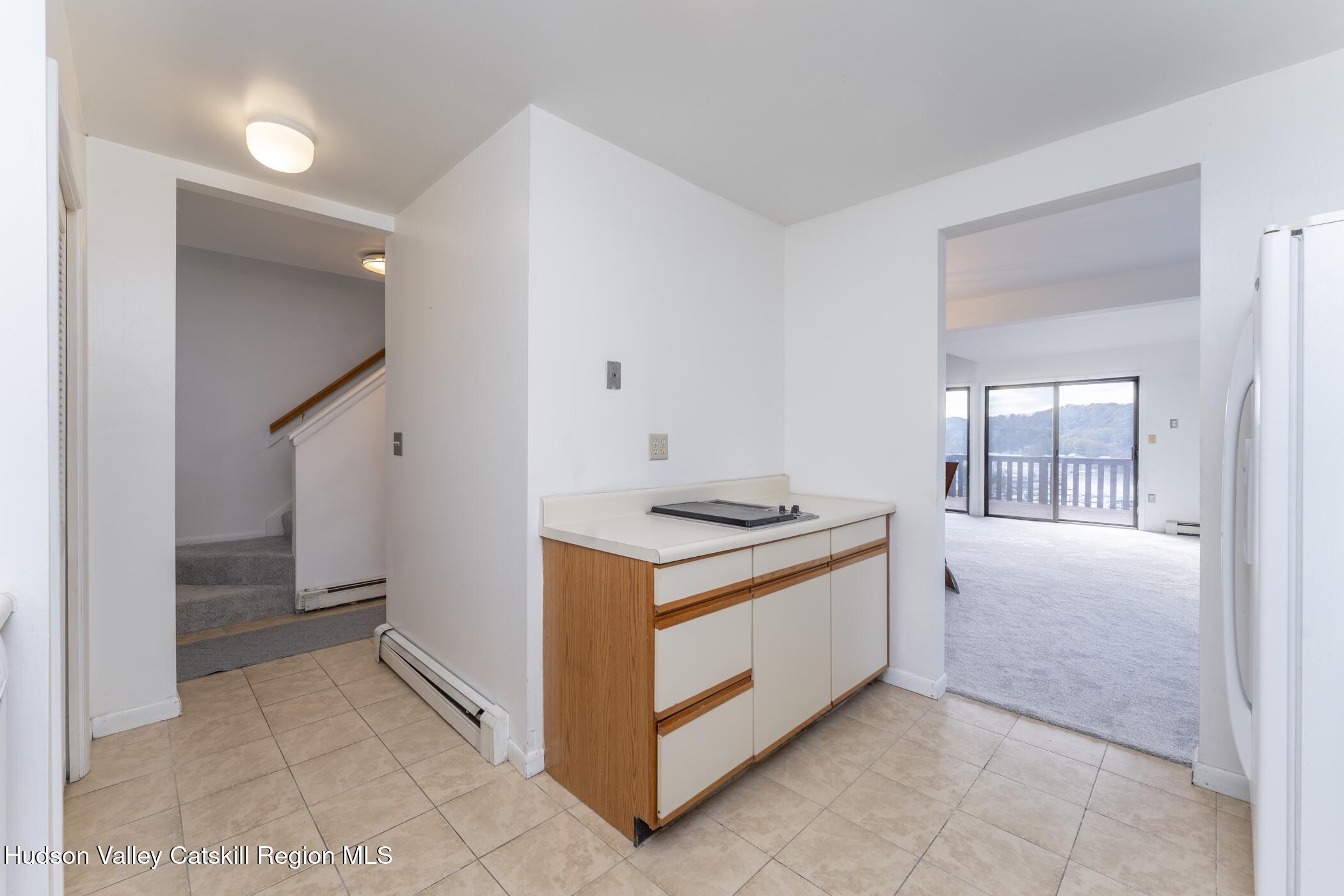 34 Rondout Harbor Port Ewen, NY 12466 - Photo 10 of 42 a kitchen with a stove and a refrigerator