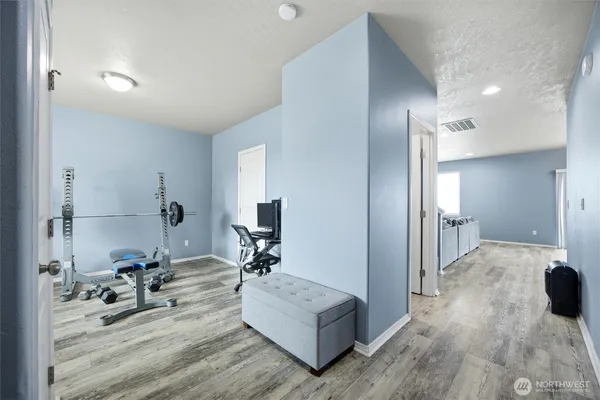 a view of a living room and bathroom