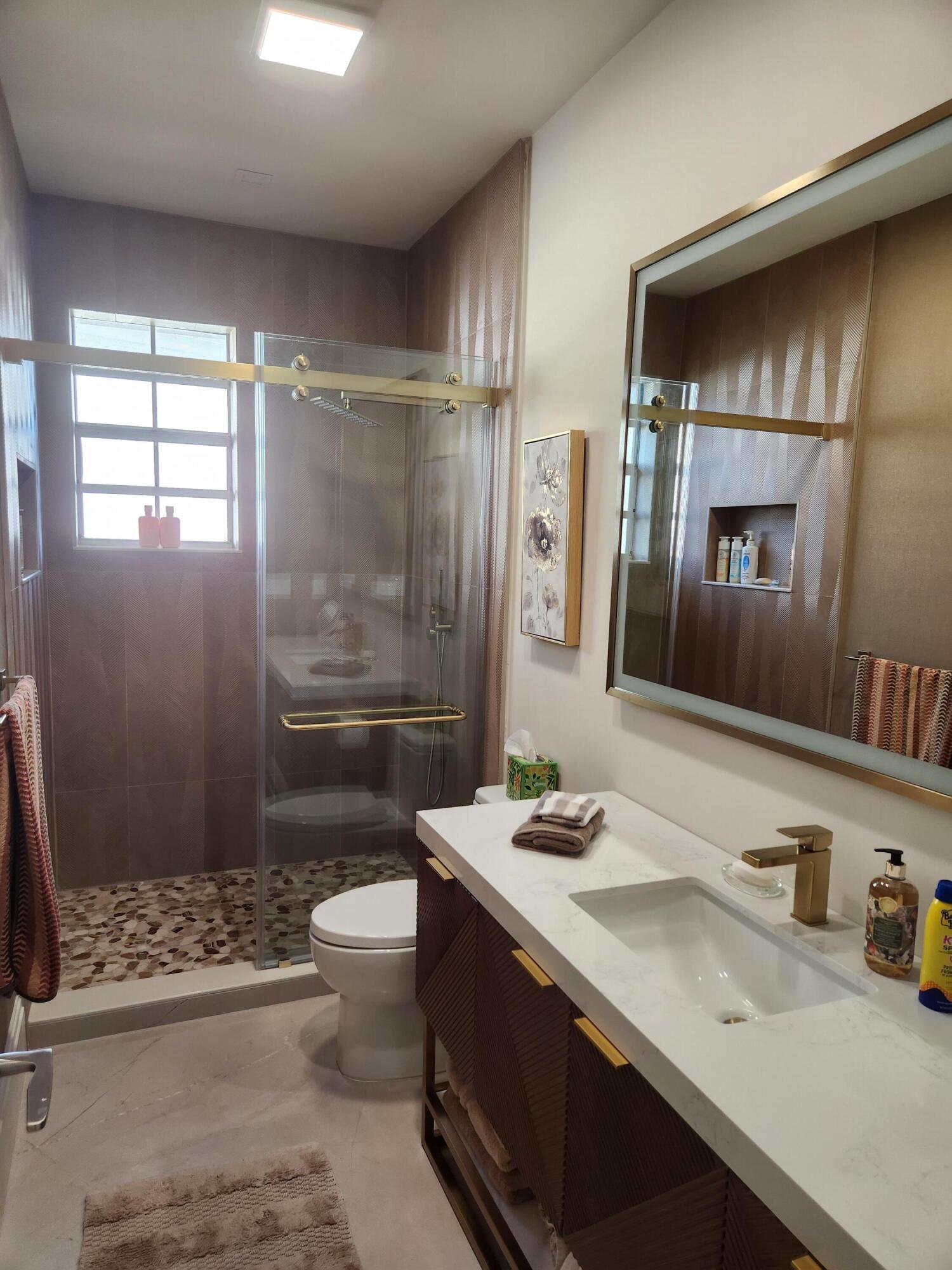 5480 Northwest 41st Terrace Boca Raton, FL 33496 - Photo 16 of 42 Jack & Jill Bathroom