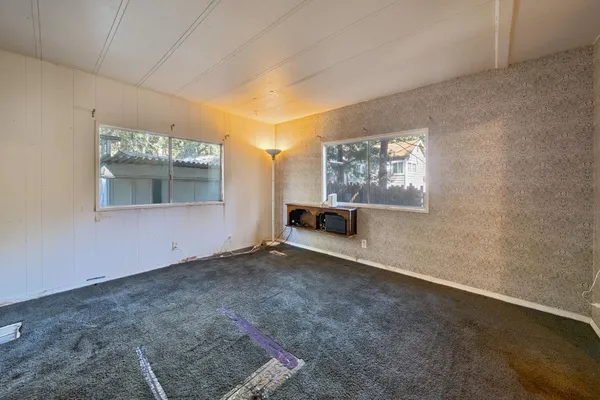 an empty room with windows