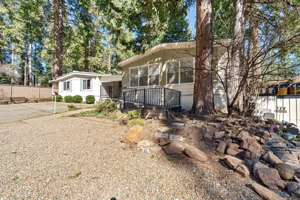 a house with trees in the background