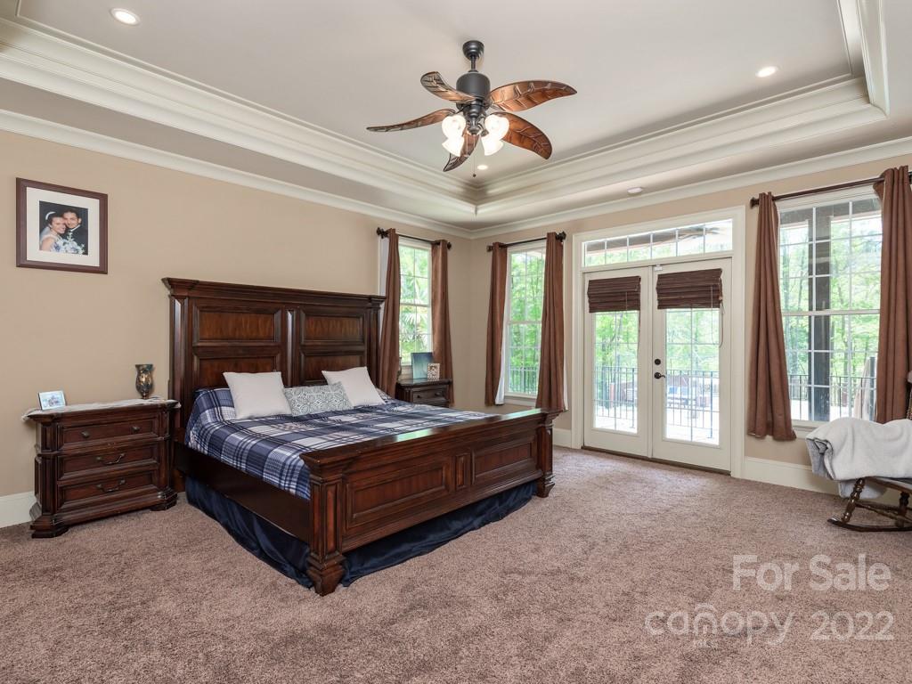 2367 Vineyard Road Fort Mill, SC 29708 - Photo 15 of 39 a bedroom with a bed and a large window