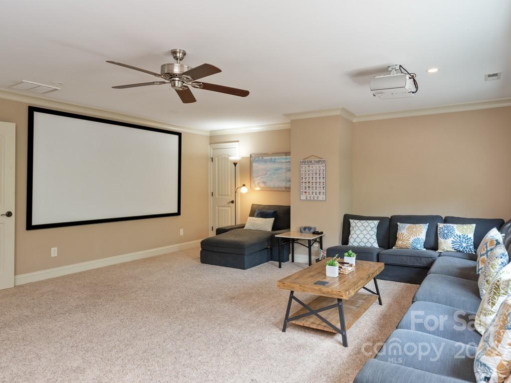 2367 Vineyard Road Fort Mill, SC 29708 - Photo 23 of 39 a living room with furniture and a ceiling fan