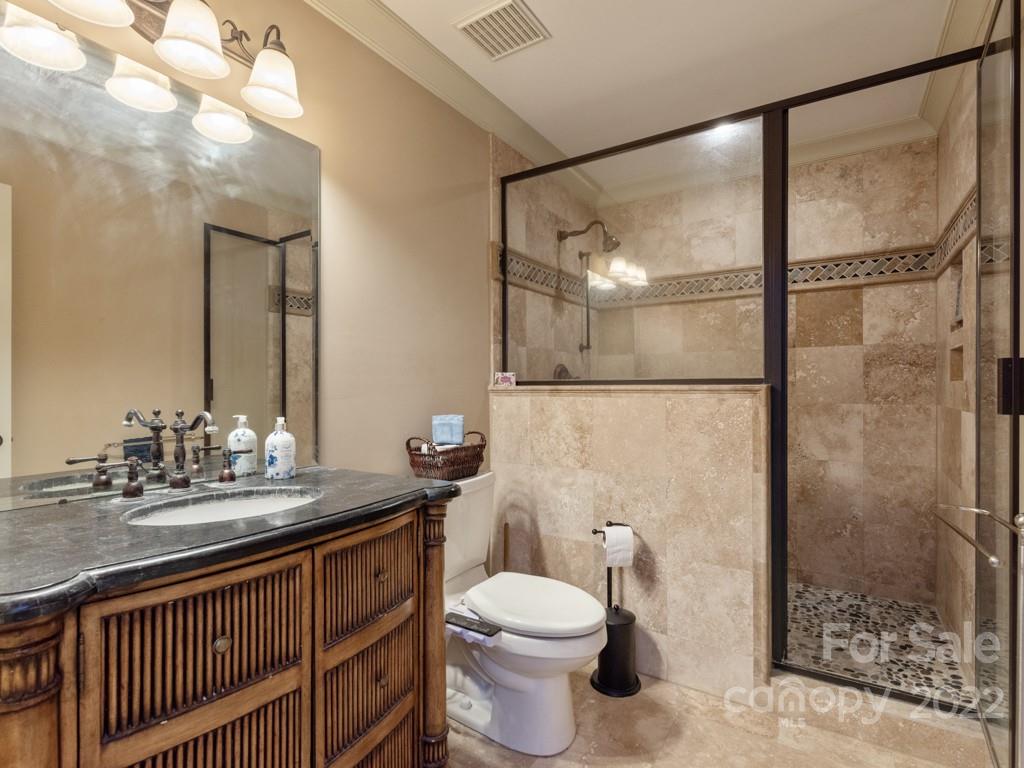 2367 Vineyard Road Fort Mill, SC 29708 - Photo 25 of 39 a bathroom with a sink toilet and shower