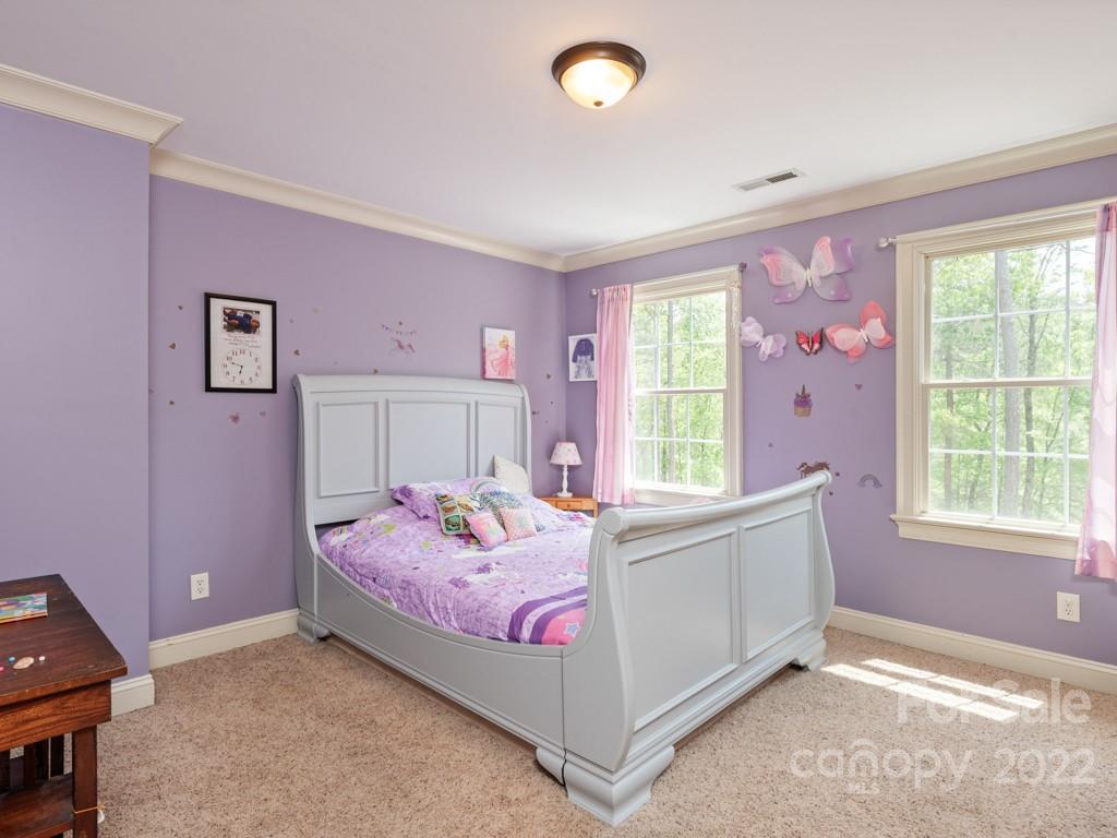 2367 Vineyard Road Fort Mill, SC 29708 - Photo 26 of 39 a bedroom with a bed and window