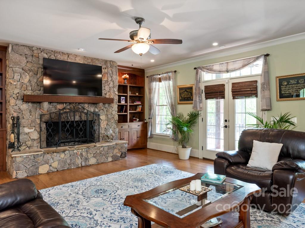 2367 Vineyard Road Fort Mill, SC 29708 - Photo 7 of 39 a living room with furniture and a flat screen tv