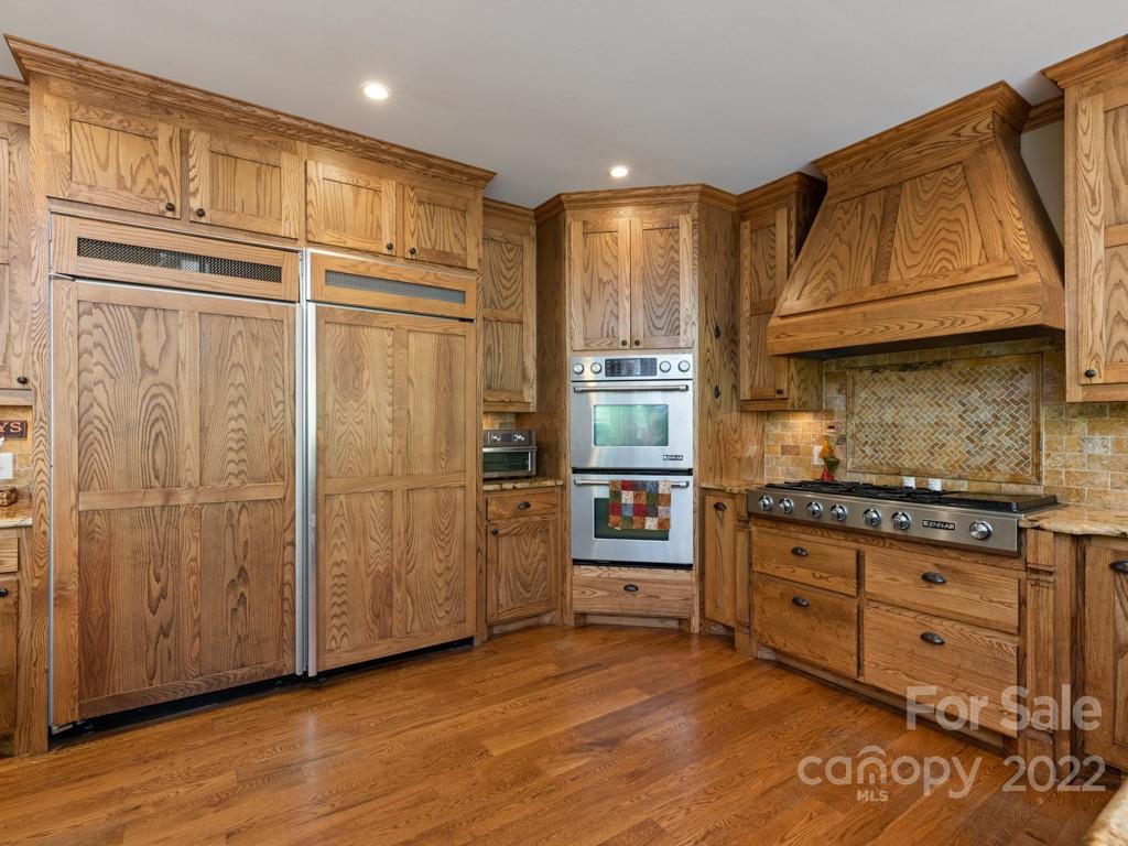 2367 Vineyard Road Fort Mill, SC 29708 - Photo 9 of 39 a kitchen with stainless steel appliances granite countertop a refrigerator and a stove