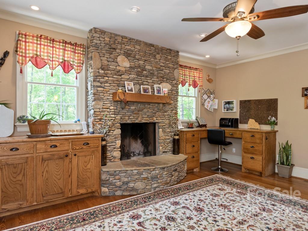 2367 Vineyard Road Fort Mill, SC 29708 - Photo 10 of 39 a living room with furniture a window and a fireplace