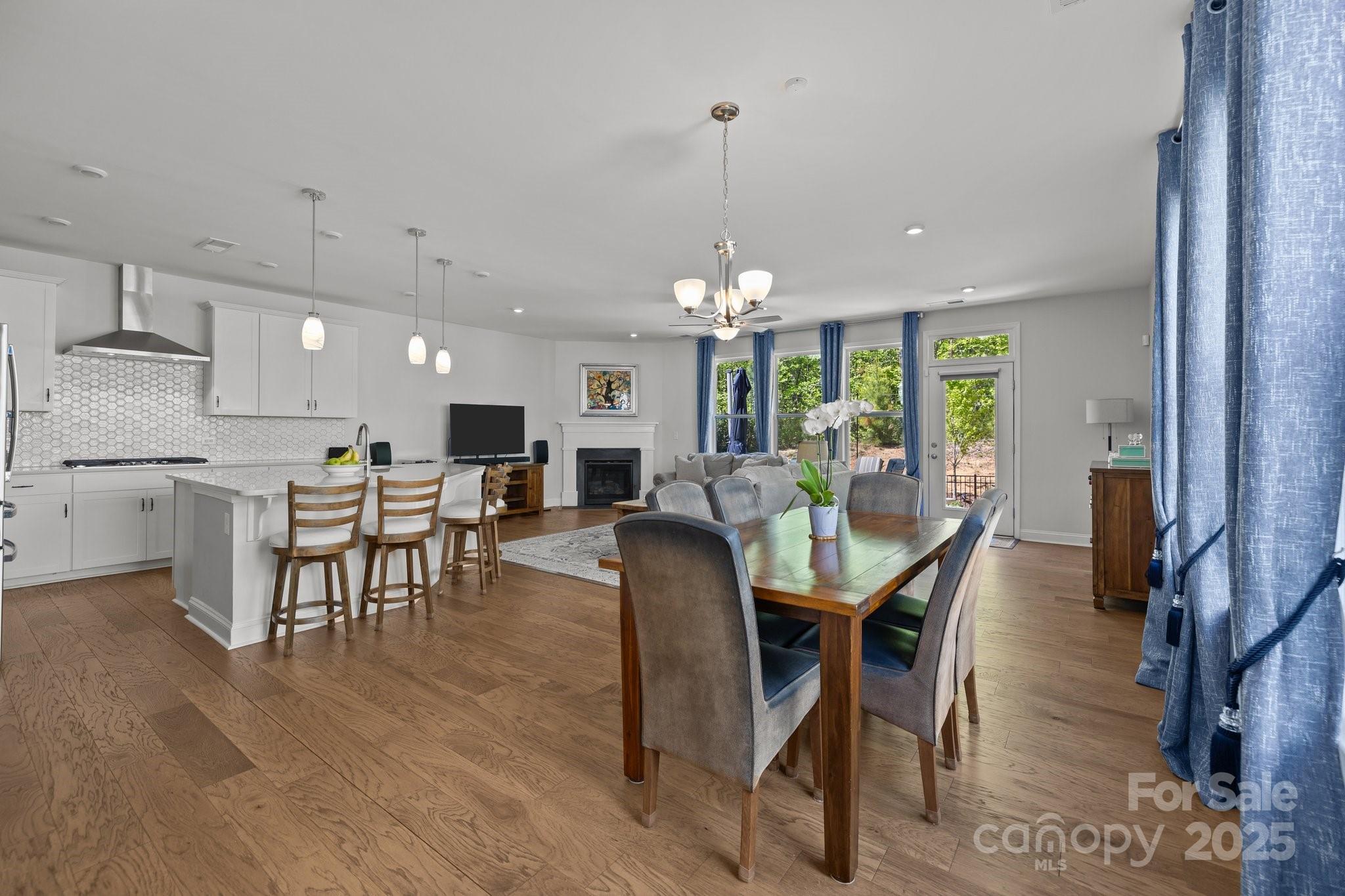 2034 Suttonview Road Fort Mill, SC 29708 - Photo 4 of 36 a view of a dining area with furniture and chandelier