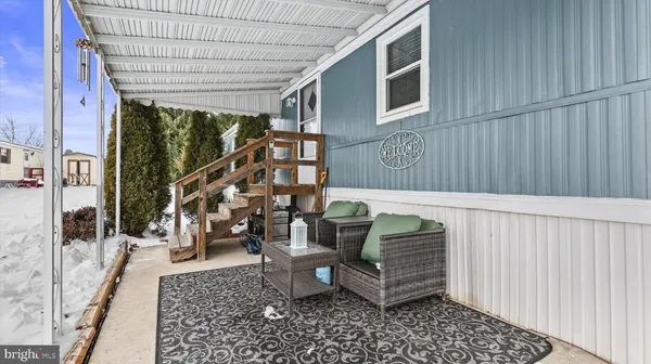 a building outdoor space with patio furniture