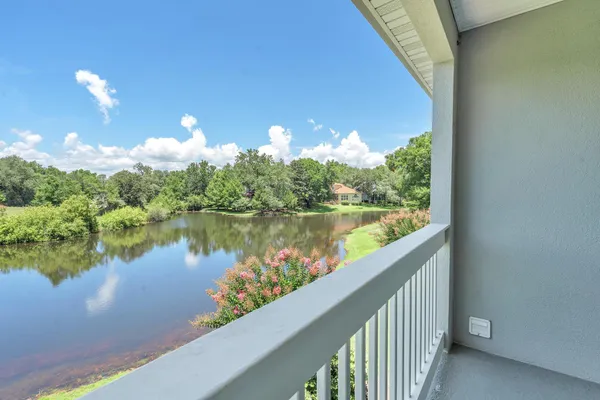 a view of a lake from a balcony