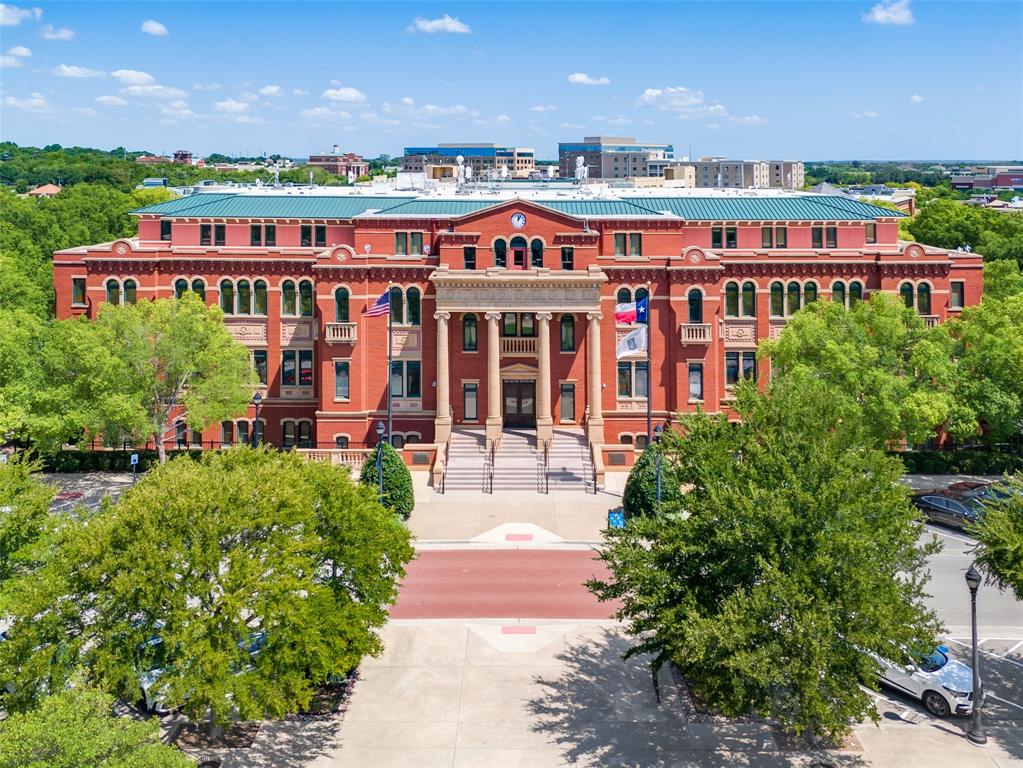 1530 Meeting Street, Unit 1103 Southlake, TX 76092 - Photo 14 of 40 a view of a large building with a lot of plants and trees