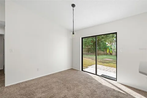 a view of a room with a large window