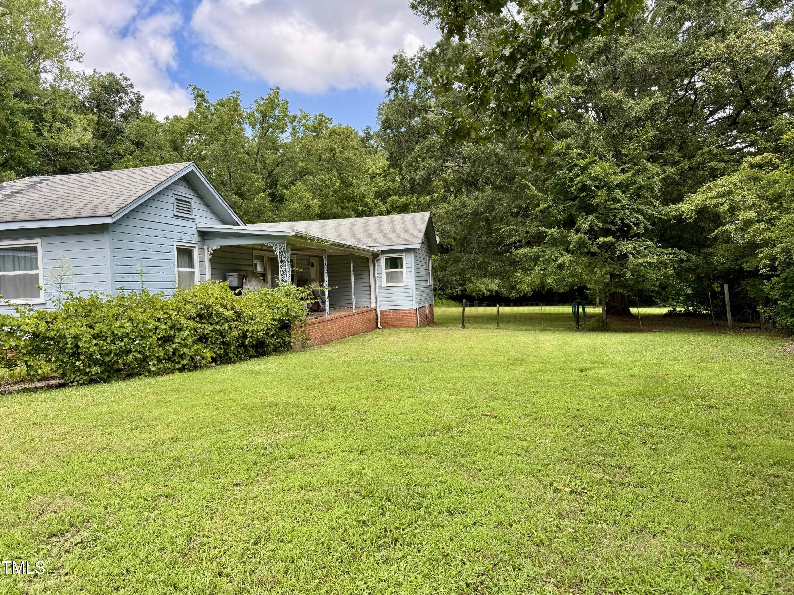 1817 Old Oxford Road Durham, NC 27704 - Photo 12 of 19 a view of a house with a yard