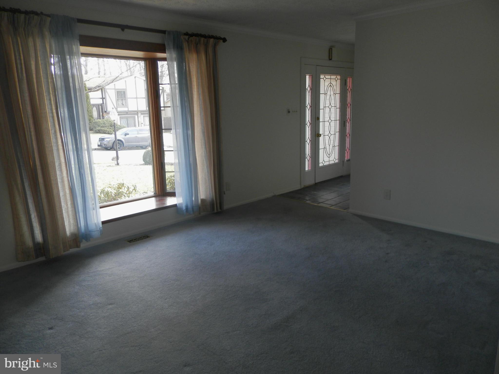 8624 Sherington Road Baltimore, MD 21236 - Photo 2 of 30 Living Room With Large Bow Window