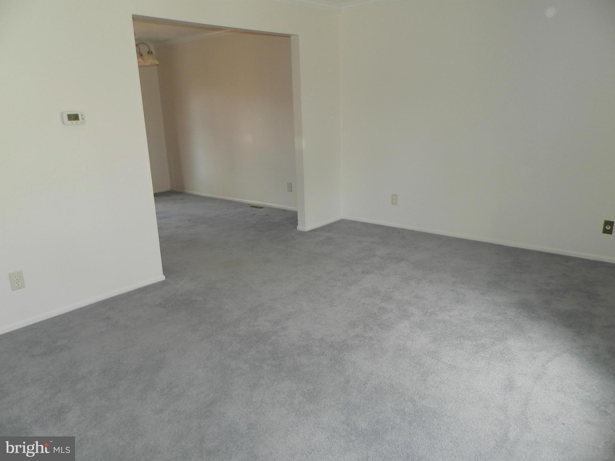 8624 Sherington Road Baltimore, MD 21236 - Photo 6 of 30 Living Room view towards Dining Room