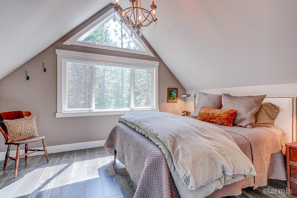 742 Kiowa Drive South Lake Tahoe, CA 96150 - Photo 19 of 26 a bedroom with a bed and a window
