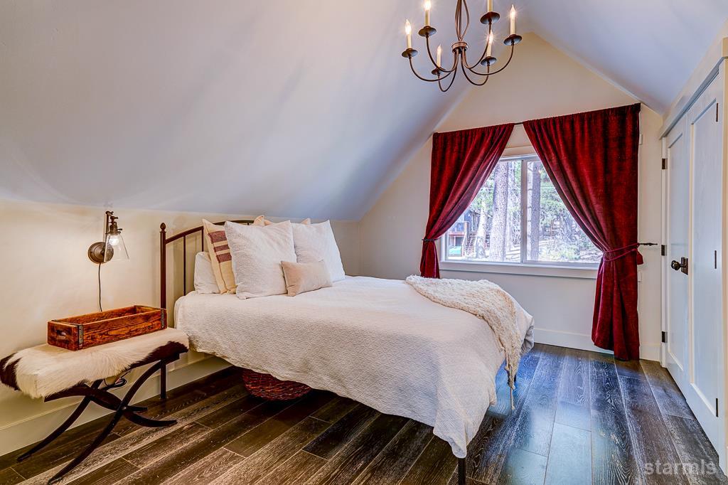 742 Kiowa Drive South Lake Tahoe, CA 96150 - Photo 21 of 26 a bedroom with a bed and a window