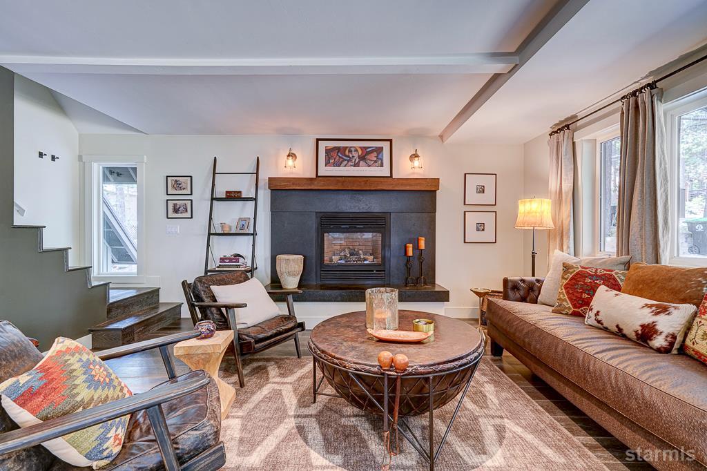 742 Kiowa Drive South Lake Tahoe, CA 96150 - Photo 7 of 26 a living room with furniture and a fireplace