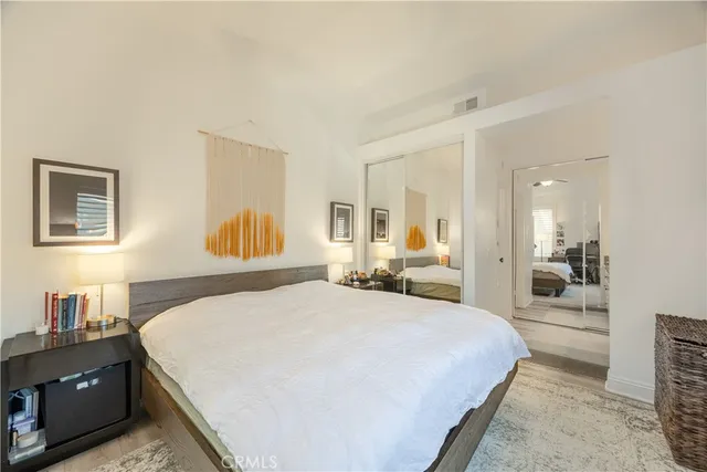 a en suite bathroom with double sink and a mirror of shower