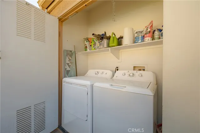 a backyard of a house with sitting area