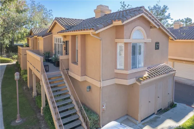 a view of a house with a street