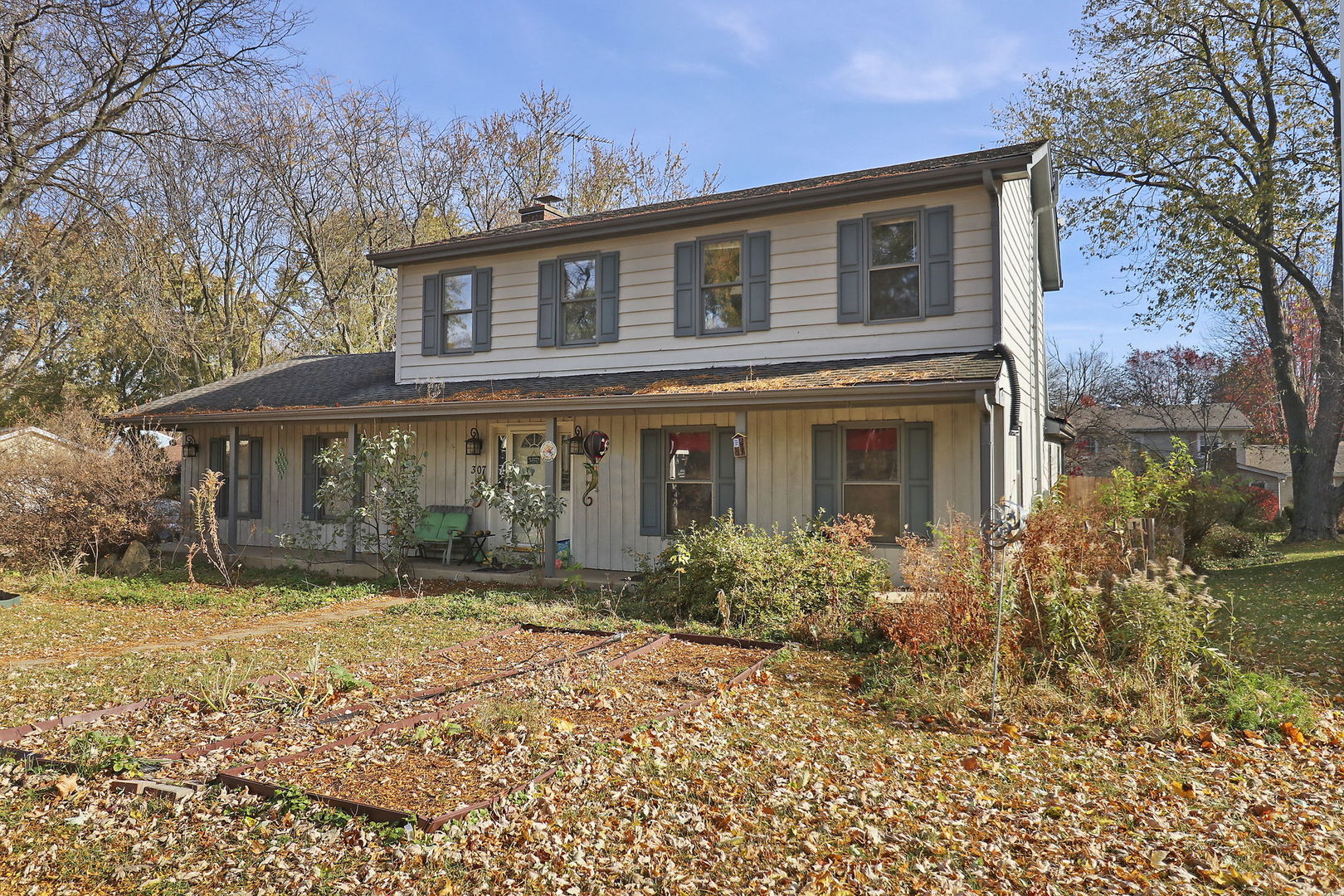 front view of a house with a yard