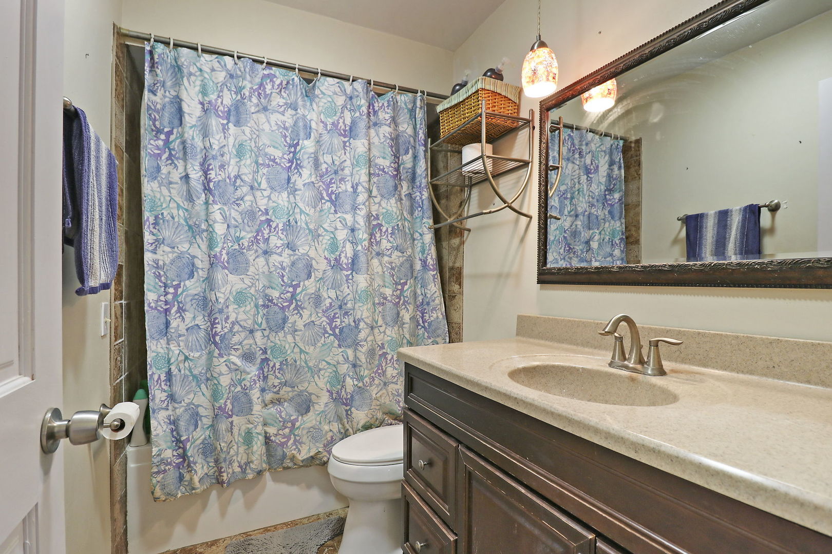 307 South Wulff Street Cary, IL 60013 - Photo 21 of 35 a bathroom with a sink a toilet and shower