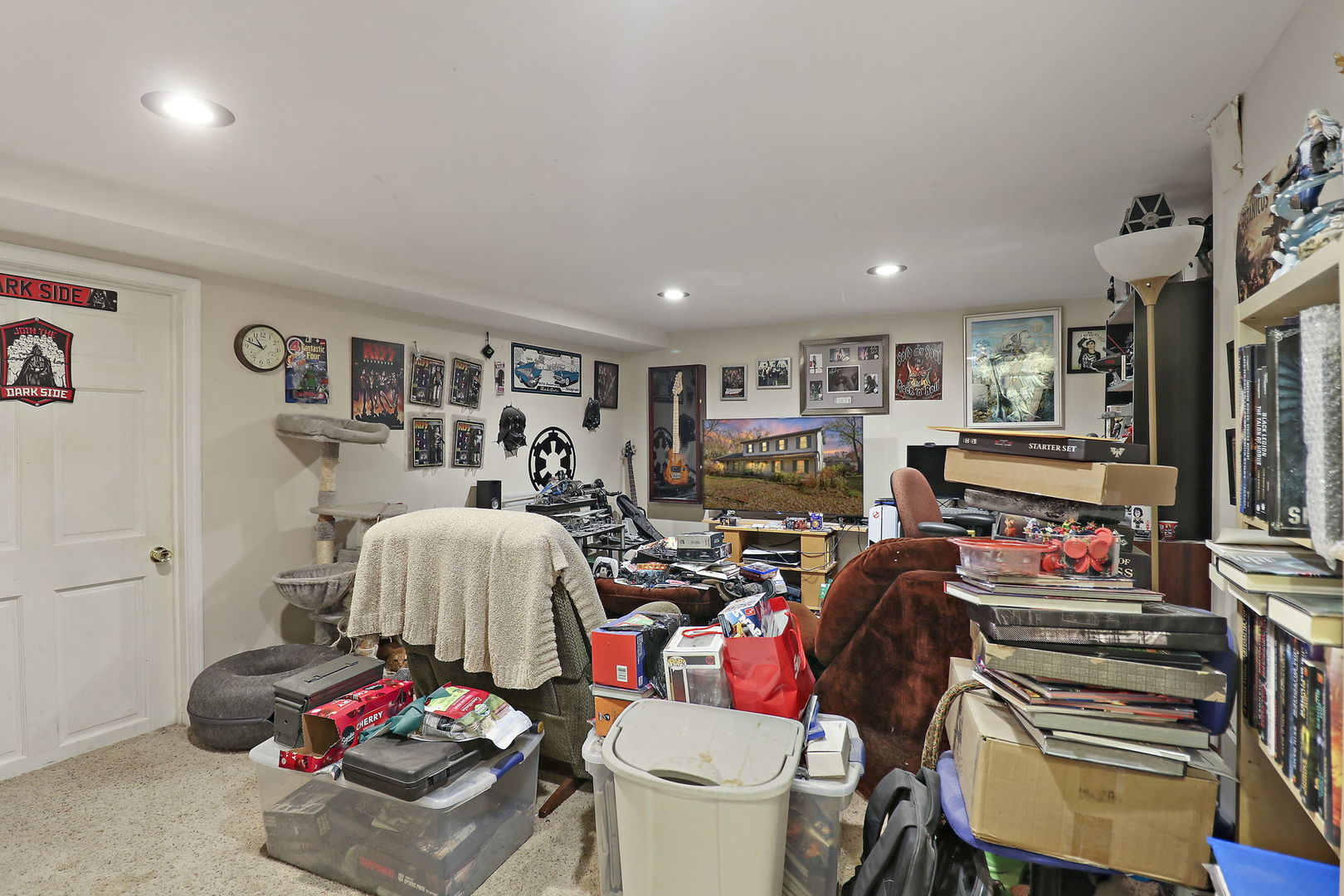 307 South Wulff Street Cary, IL 60013 - Photo 24 of 35 a bed room with furniture and a flat screen tv