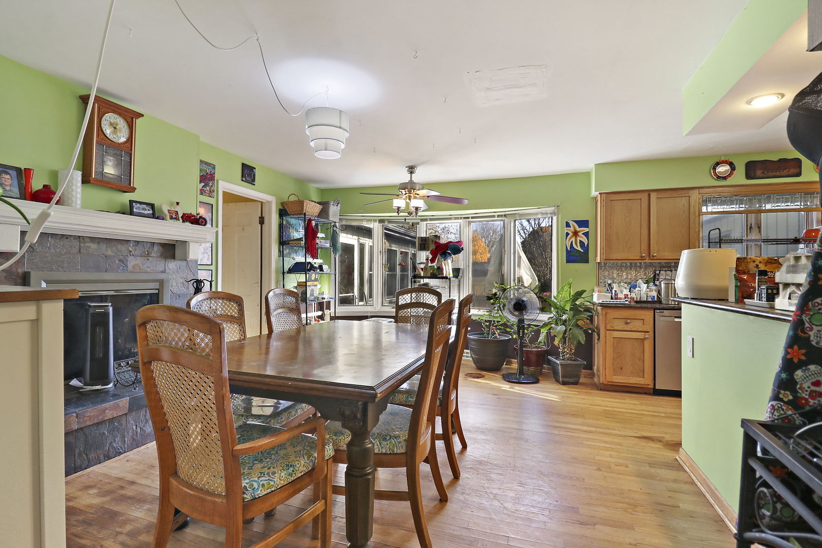 307 South Wulff Street Cary, IL 60013 - Photo 3 of 35 a view of a dining room with furniture and wooden floor