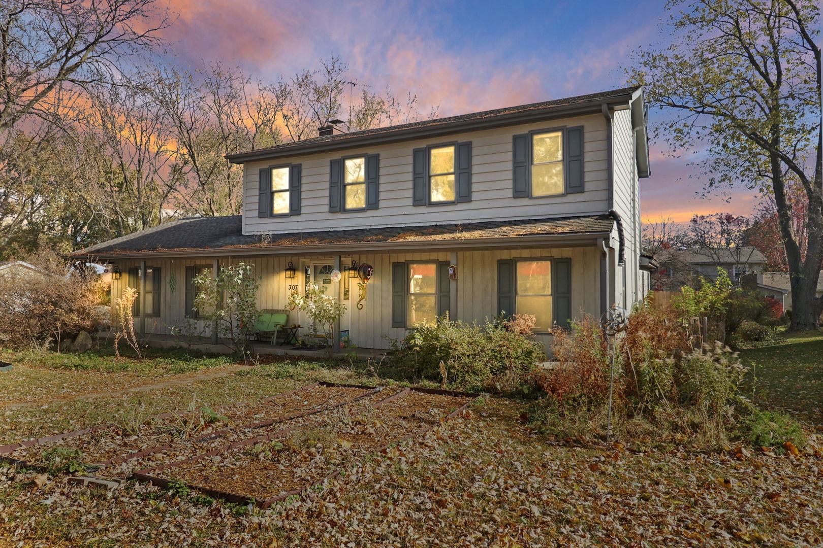 307 South Wulff Street Cary, IL 60013 - Photo 32 of 35 front view of a house with a yard
