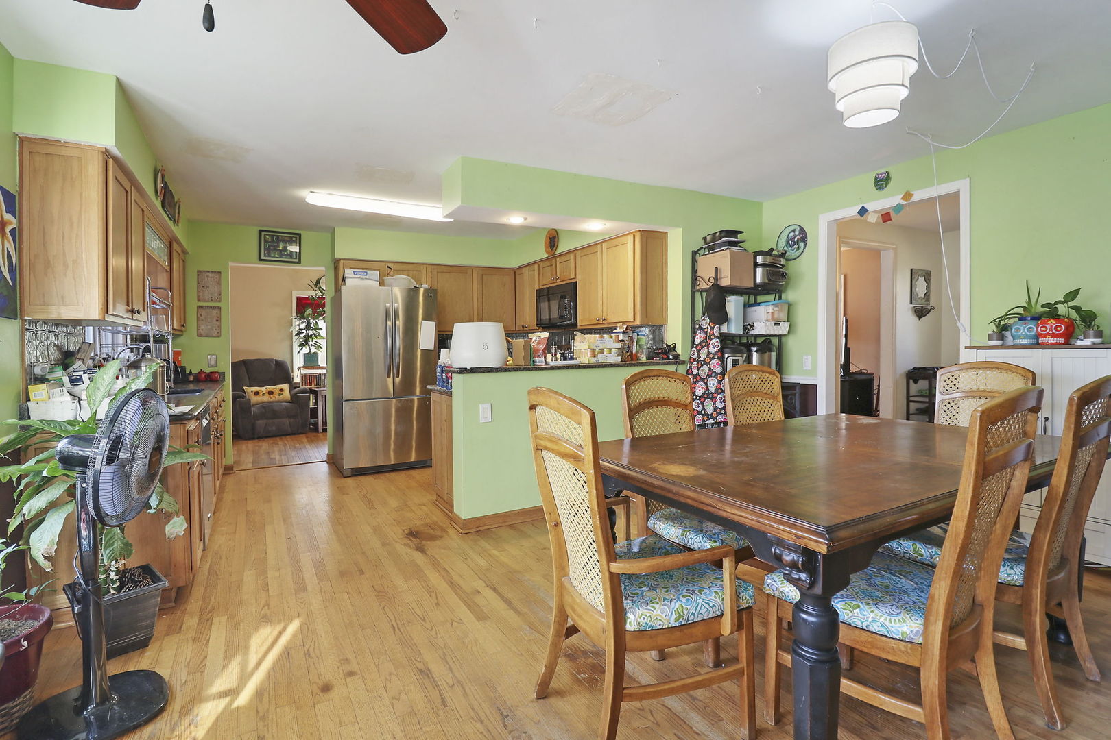 307 South Wulff Street Cary, IL 60013 - Photo 4 of 35 a dining room with furniture and wooden floor