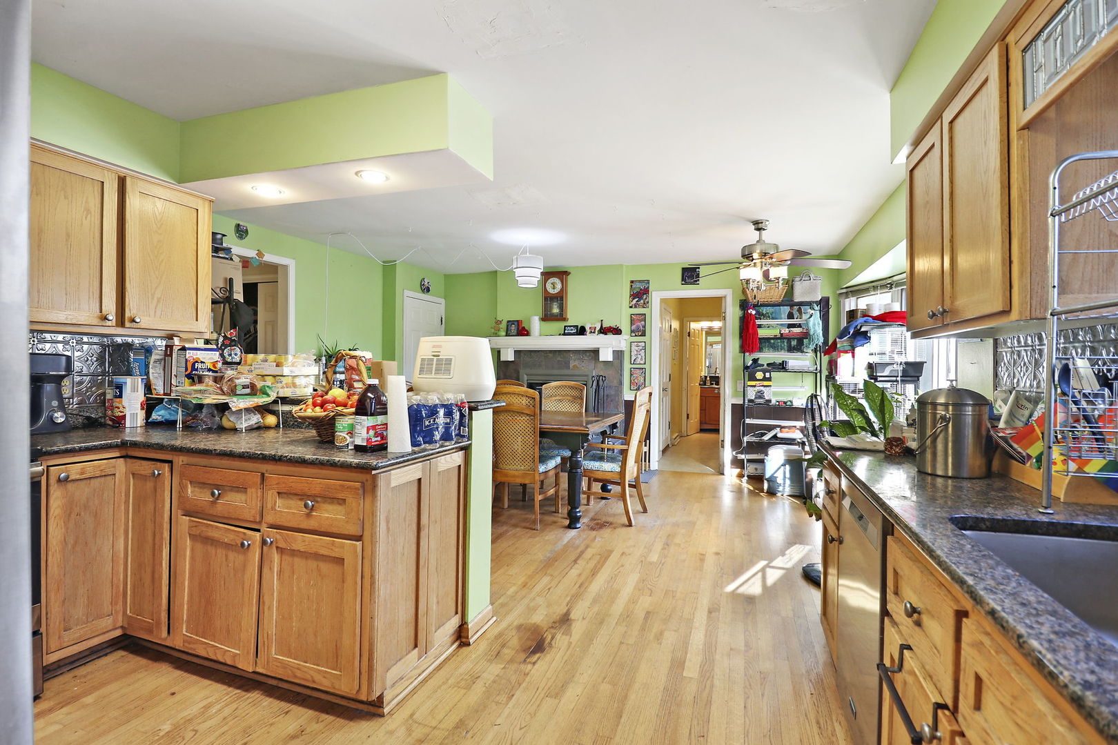 307 South Wulff Street Cary, IL 60013 - Photo 6 of 35 a view of a kitchen and dining room